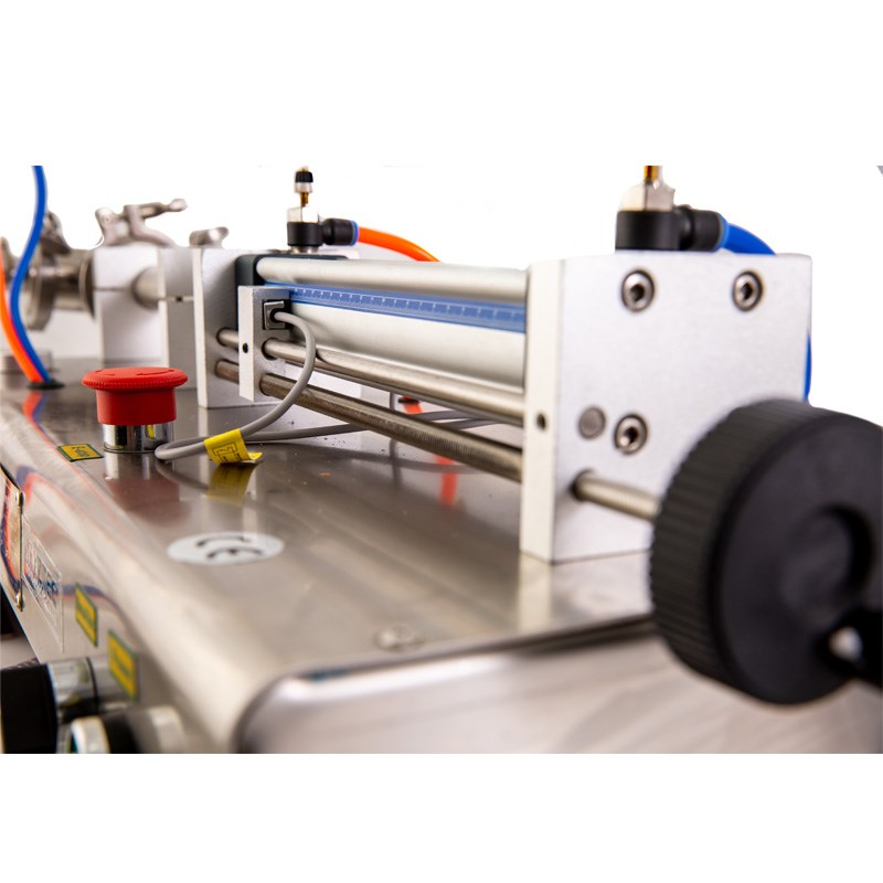 دستگاه پرکن مایعات رقیق 10 الی 100 میلی لیتر پنوماتیک سیستم مکنده خلاء مدل F9