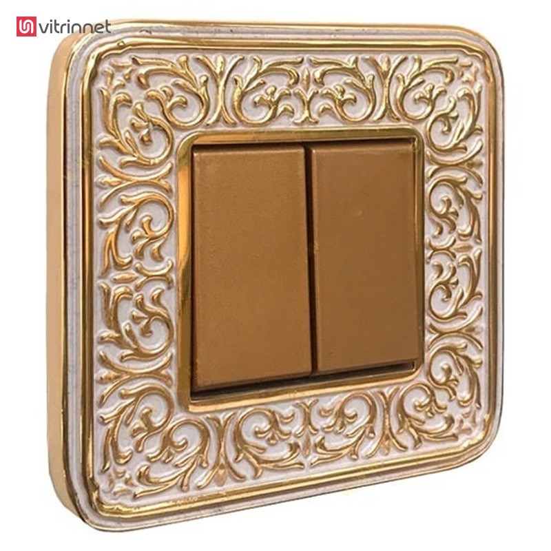 کلید و پریز آنتیکو سری FIORE طلایی با کادر پتینه سفید